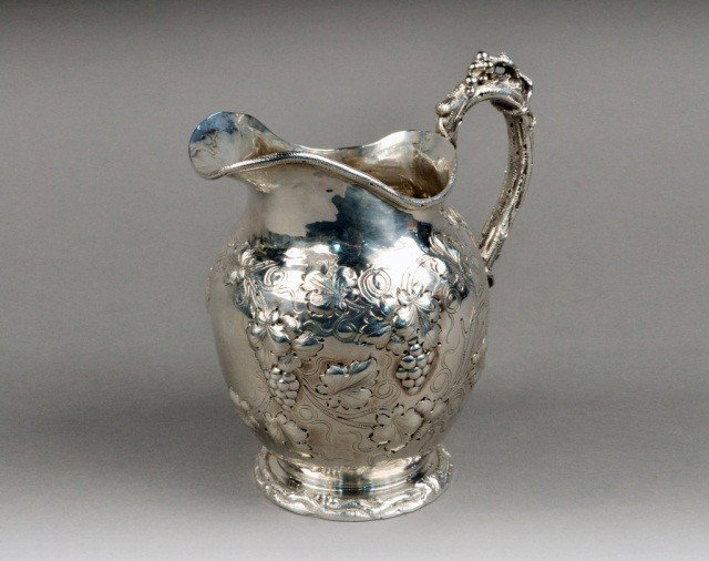 Sterling Silver Water Pitcher: Retailed by Black Starr & Frost, repousse decoration of grapes and vines. Height 9 inches, approximately 24 ounces.