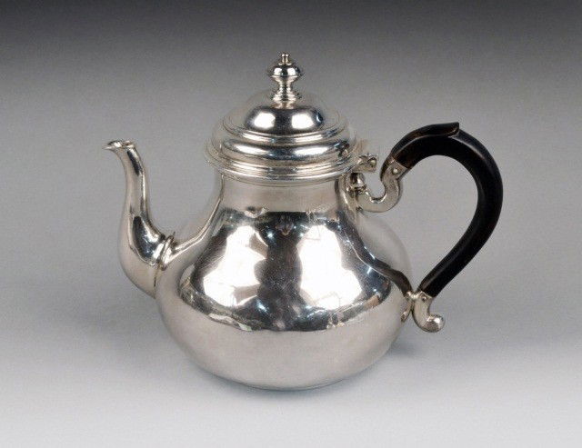 English Silver Teapot: James Robinson, London, 1968, bombe form with wood handle. Height 7 1/2 inches, approximately 28 ounces, all inclusive.