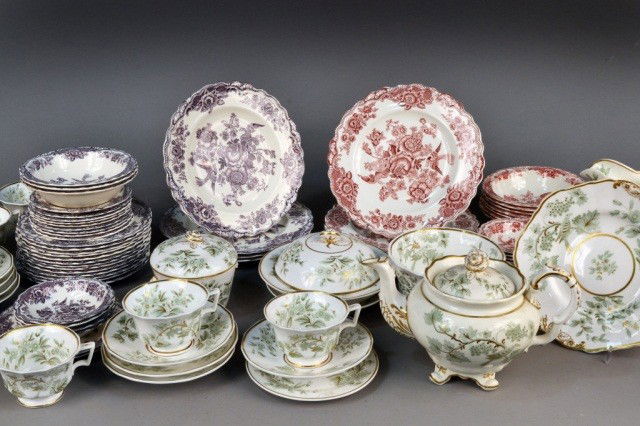 Miscellaneous Group of English Transferware: Comprising a Spode porcelain tea service with green foliate decoration with gilt highlights; together with two partial sets of Crown Ducal pottery dinner services, one in red and the other purple tran
