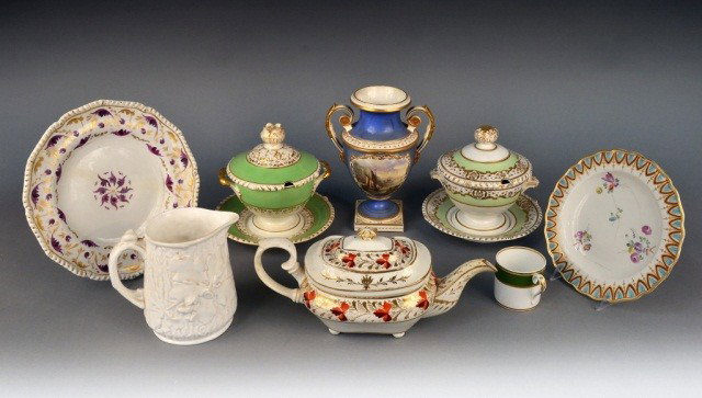 Group of Derby Porcelain: Comprising two sauce tureens, teapot, footed vase and two plates, mostly 19th century; together with a Minton pottery pitcher. Vase height 9 inches.