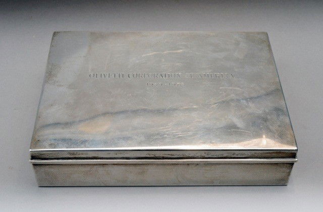 Tiffany & Co. Sterling Silver Cigarette Box: Rectangular box with wood liner, monogrammed. Height 2 inches, width 9 inches, depth 6 inches.