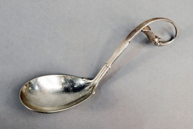 Georg Jensen Silver Serving Spoon: Pattern 21, circa 1945. Approximately 2 ounces.