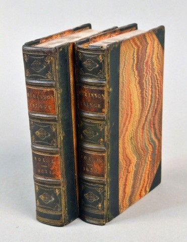 George Cruikshank Robinson Crusoe: Two volumes. London: John Major, 1831. Contemporary half morocco. (As is condition).
