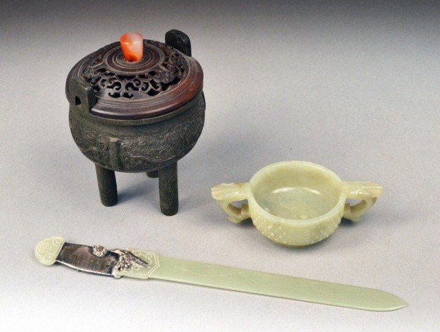 Three Asian Table Articles: Including, one silver mounted jade letter opener, one jade two-handled bowl and one bronze censor. Tallest height 6 inches.