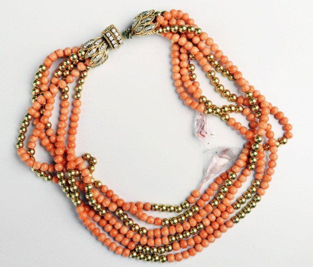 Gold Diamond and Coral Bead Necklace *: 14k yellow gold six strand torsade necklace with alternating coral and gold beads measuring 4mm, finished with a diamond clasp. Length 15 inches. Note: Gift of Bethsabée de Rothschild to Martha Graha
