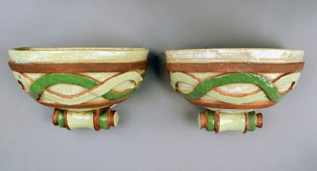 Pair of Vintage Ceramic Wall Lights: Green/Brown painted, and wired with porcelain sockets. Height 6 inches, width 11 inches.