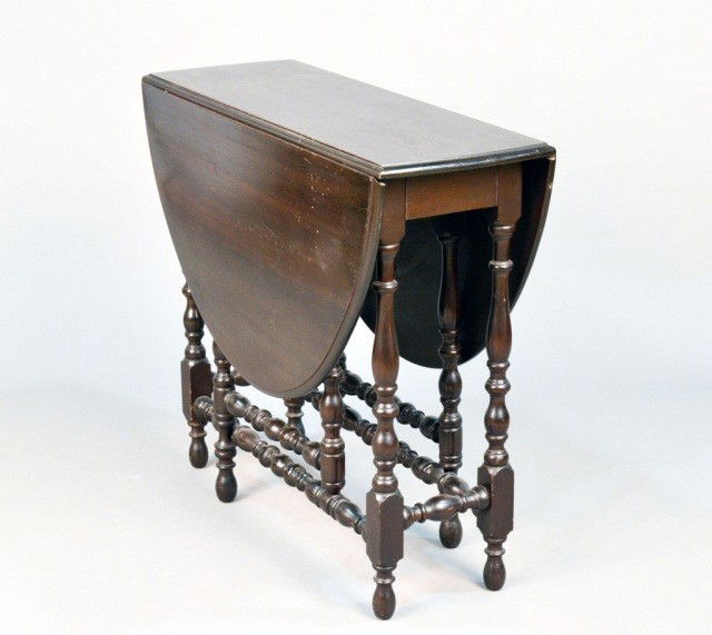 Drop Leaf Gate Leg Table: Height 31 inches, width 34 inches, depth (closed) 13 inches.
