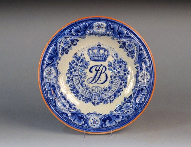 Delft Pottery Charger: Floral border accented with the names Beatrix, Margriet, Maryke and Irene and dated 7 January 1927 and 7 July 1949. Diameter 14 inches.