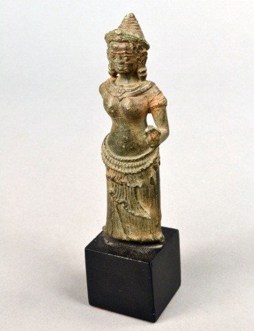 Early Cambodian Bronze Figure of a Deity: Modeled standing. Height 5 1/2 inches. Ex. Coll. Martha Graham