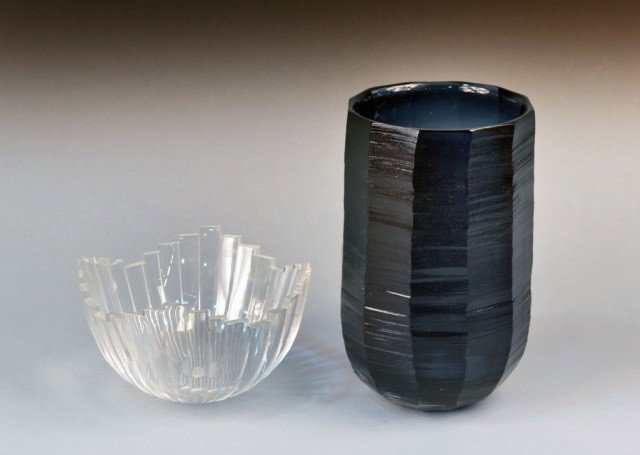 Orrefors Glass Vase and Bowl: Colorless glass bowl; together with a black glass vase. Vase, height 11 inches.