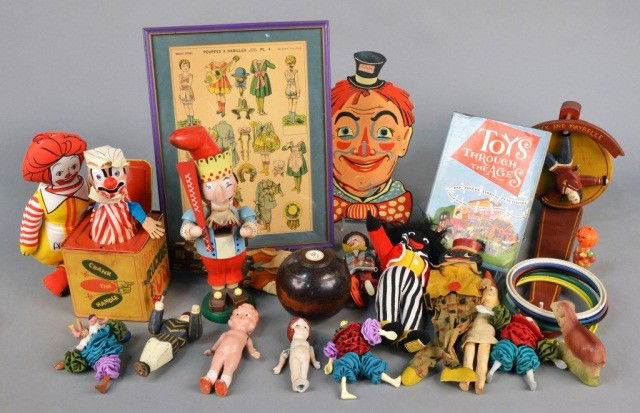 Group of Vintage Dolls, Puppets and Toys: Including paper dolls, a jack in the box, etc. Together with a book Toys Through the Ages by Dan Foley. Various sizes.