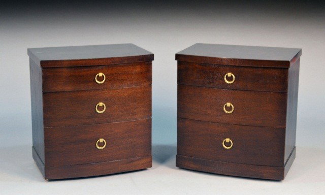 Pair of Nightstands: Circa 1950, in the style of Dorothy Draper, each with bow front top over three drawers with rope ring pulls. Height 24 inches, width 22 inches, depth 15 inches.