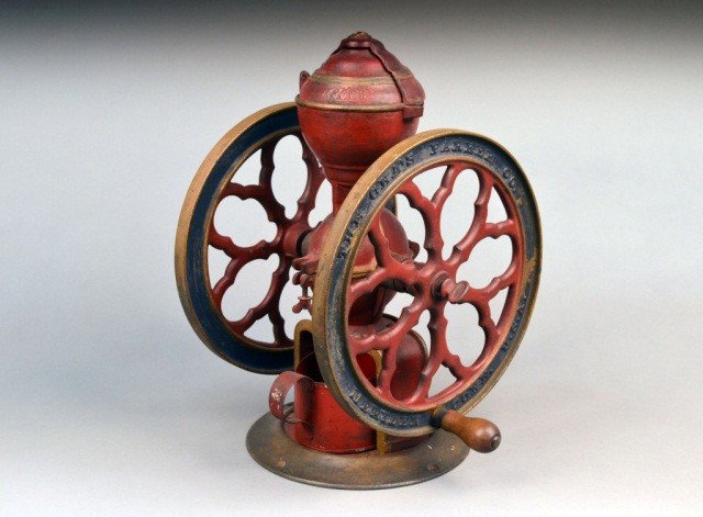 Vintage Coffee Grinder: Metal with wood handles. The Cha's Parker Co. Meriden, Conn. USA. Numbered "3003". Height 18 1/2 inches.