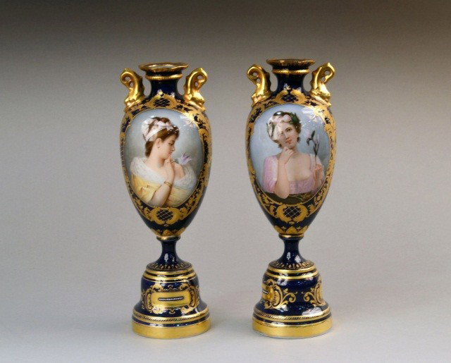 Pair of Royal Vienna Porcelain Portrait Urns: Each with reserve painted with a portrait of a young woman, signed Fried., overglaze blue beehive mark. Height 12 inches.