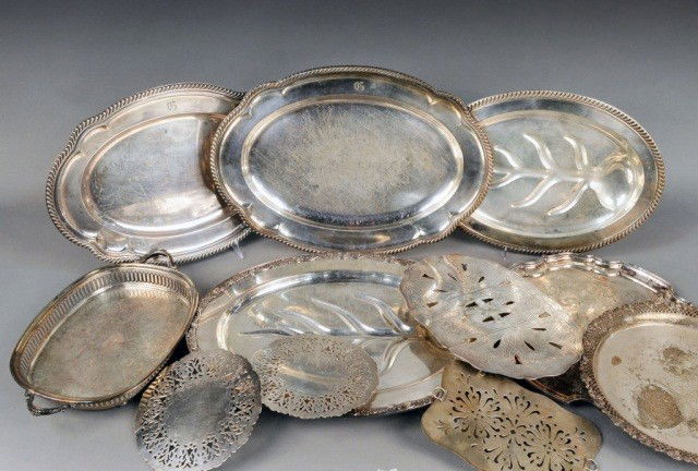 Group of Silver Plated Trays & Trivets: Comprising fove oval trays, two circular trays and four trivets. Largest oval tray, length 19 inches.