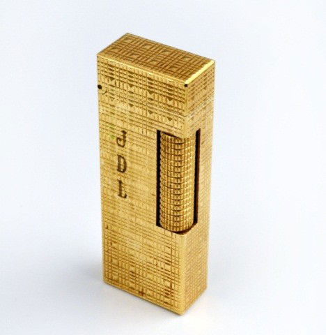 Gold Tone Dunhill Lighter: Textured finish. Height 2 1/2 inches.