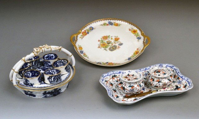 Spode Porcelain Egg Tray: Blue and white with gilt highlights, diameter 7 inches; together with a Limoges porcelain inkstand, length 9 inches and a cake plate.