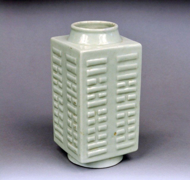 Chinese Celadon Pottery Tsun Vase: With raised geometric decoration. Height 7 inches.