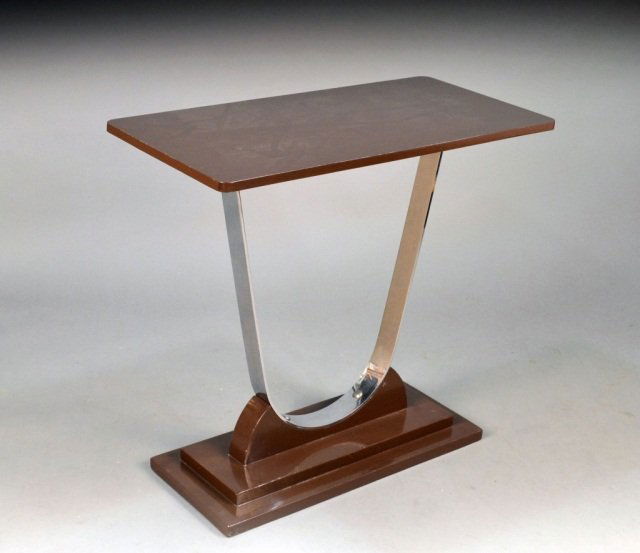 Wolfgang Hoffman (Aust/Am) Wood and Chrome Console: Circa 1930, rectangular lacquered wood top on a chrome support and stepped base. Height 30 inches, width 32 inches, depth 16 inches. Provenance: Historical Materialism, Hudson, New York