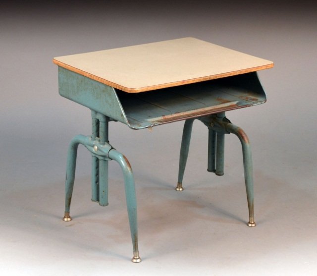 Child's Metal Desk: Circa 1960, blue painted desk with adjustable legs. Height 23 inches, width 24 inches, depth 18 inches. Provenance: Historical Materialism, Hudson, New York