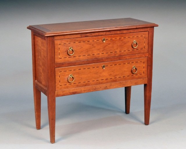 Hepplewhite Style Two Drawer Commode: Rectangular top with molded edge above two inlaid drawers with square tapered legs. Height 34 1/2 inches, width 38 inches, depth 16 inches.