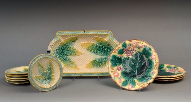 Miscellaneous Group of Majolica Table Articles: Comprising a seven piece set with rectangular tray and six plates along with a set of four plates. Tray length 14 inches.