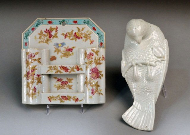 Two Chinese Porcelain Wall Pockets: Late 19th century, one a blanc de chine figure of a bird; and the other a double vase pocket. Bird, height 10 inches.