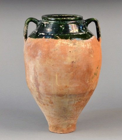 Large Ceramic Vessel: After the antique the rim and neck with green glaze and two applied handles. Height 22 1/2 inches.