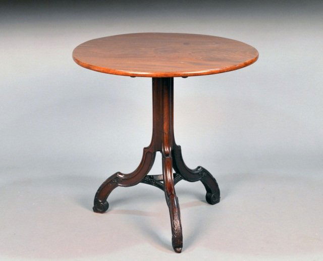 George II Mahogany Tilt Top Table: 18th century, with tripod base. Height 28 inches, diameter 27 1/2 inches.