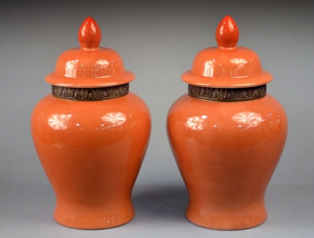 Pair of Glazed Ginger Jars: Iron red crackle glaze covered jars. Height 17 1/2 inches.
