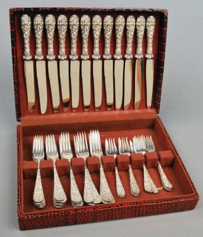 Schofield Co. Sterling Silver Flatware Service: Baltimore Rose pattern, in silverware box, comprising twelve knives, twelve dinner forks, twelve dessert forks, and twelve salad forks.
