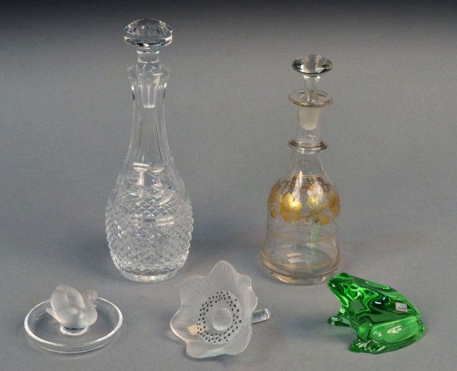 Miscellaneous Group of Glass Decorations: Lalique flower and dish, a Baccarat frog, a Waterford decanter and another decanter. Tallest decanter, height 12 inches.