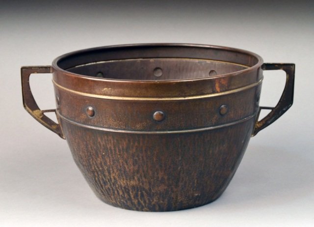 Arts & Crafts Copper and Bronze Two Handled Pot: Ovoid with flattened bottom, all around banded border. Height 6 1/2 inches, diameter 10 inches. Provenance: Historical Materialism, Hudson New York