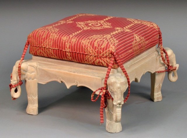 White Painted Elephant Footstool: White painted wooden footstool. Square top on four elephant form legs, upholstered seat cushion. Height 18 inches, width 26 inches, depth 26 inches.