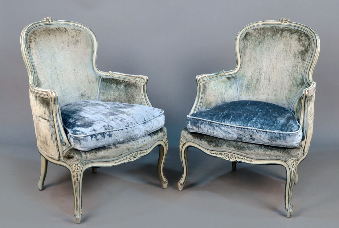 Pair of Louis XV Style Bergeres: Painted with blue upholstery, height 37 inches, width 27 inches, depth 28 inches.