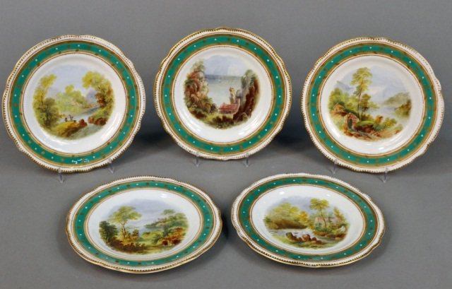 Five English Porcelain Topographical Plates: Hand painted scenes including, St. Govan's Chapel, Chepstow Castle, Loch Lomond, view of the vale of Llangollen, and a mill near Ambleside. Diameter 8 3/4 inches.