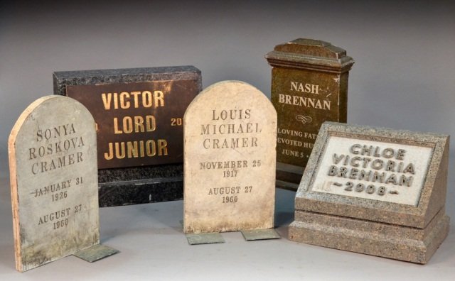 Group of Faux Painted Composition Headstones: Assorted group of five composition headstones. Comprising Victor Lord Junior, Sonya Roskova Cramer, Louis Michael Cramer, Nash Brennan, and Chloe Victoria Brennan. Largest (Victor Lord Junior) height 