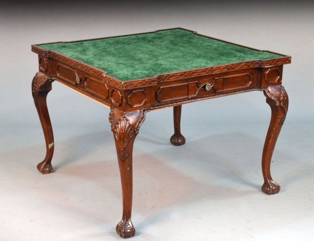 Chippendale Style Mahogany Games Table: Square green felt inset top above four cabriole legs with carved knees and ball and claw feet. Height 29 inches, width 38 inches, depth 38 inches. Provenance: From the set of "One Life to Live"