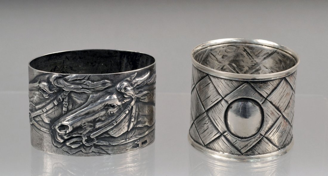 Two Russian Silver Napkin Rings: Total approximately 2 ounces.