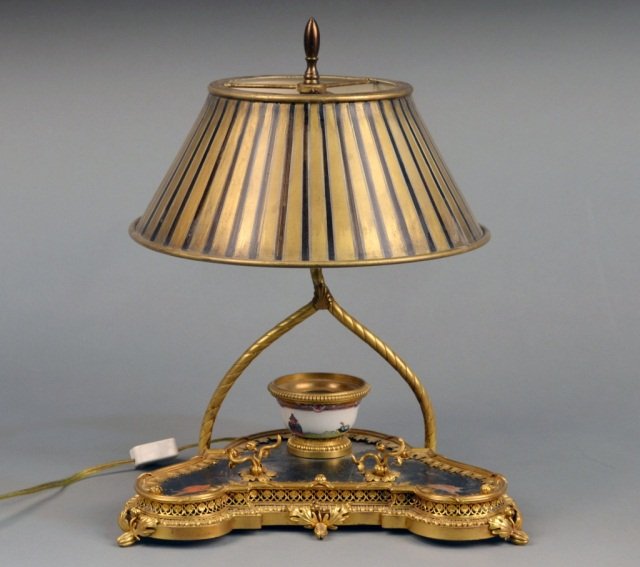 Gilt Metal Mounted Tole Desk Lamp: Leaf decoration, striped tole decorated shade. Height 12 1/2 inches.