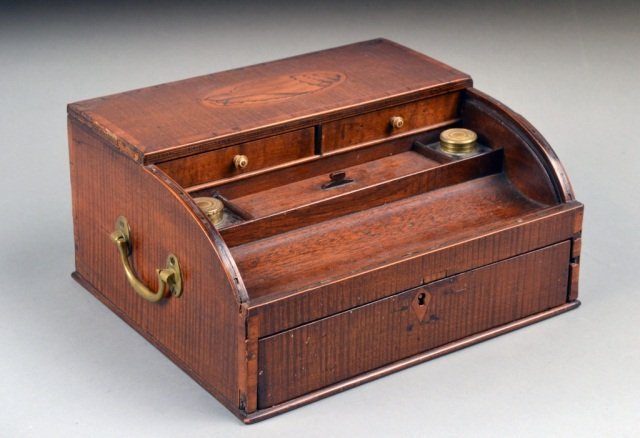 Victorian Mahogany Letter Box: Shell patera decorated top, over two drawers and pen tray, above a drawer. Height 5 1/2 inches, width 10 1/4 inches, depth 9 1/4 inches.