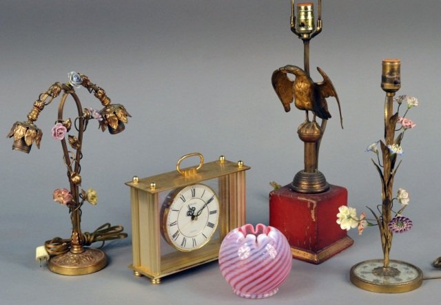 Three Gilt Metal Lamps: Two with polychrome painted ceramic flowers, the other with a spread winged eagle. Together with a Seiko brass desk clock and an American 19th century glass vase. Eagle lamp height 16 1/2 inches.