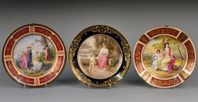 Three Royal Vienna Porcelain Cabinet Plates: (1) Ernst, signed Otto Dressl, marked Royal Vienna under glaze and Austria over glaze with a cobalt border with gilt decoration, diameter 9 5/8 inches; (2) Lady Rushout, Old Vienna, signed I. Christy,