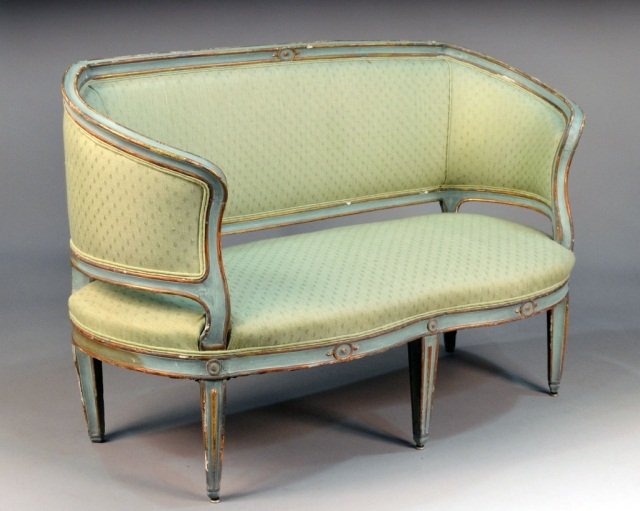 Louis XV Style Painted Settee: Parcel gilt and green painted, upholstered back and seat atop tapered legs. Height 36 inches, width 60 inches, depth 27 inches.