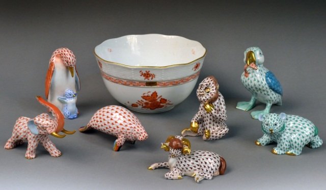 Group of Herend Fish Net Porcelain Animals: Comprising an elephant, baboon, puffin, penguin, sea lion, bear and ram; together with a bowl in Chinese Bouquet pattern (rust). Bowl, height 4 inches, diameter 7 1/2 inches.