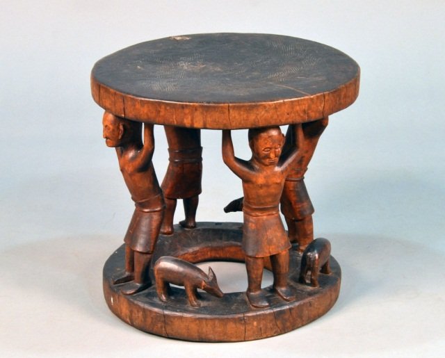 Philippines Ifugao Figural Stool: Early 20th century, carved hardwood. Height 17 1/2 inches, diameter 19 inches.