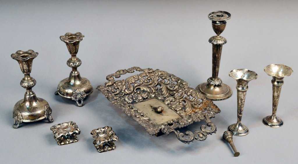 Miscellaneous Group of Continental Silver Articles: Including a Viennese silver two handle tray, a pair of German 800 silver trumpet vases, a pair of Continental silver candlesticks, a pair of Continental silver salt cellars, a weighted silver candlest