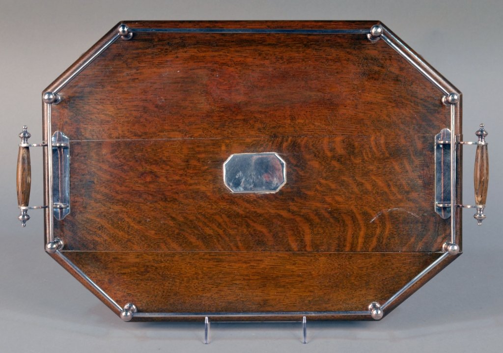 English Oak Galleried Tray: Octagonal tray with silver plated gallery. Length over handles, 22 1/2 inches.