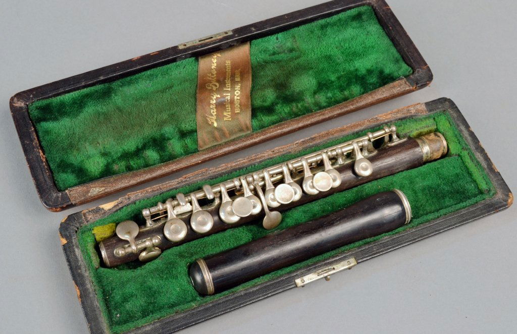 Harry Bettoney Piccolo: Silver and ebony, with fitted case bearing label for Harry Bettony Musical Instruments, Boston, Mass.