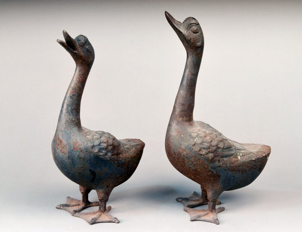 Pair of Cast Iron Ducks: Modelled with heads up. Taller, height 18 1/2 inches.